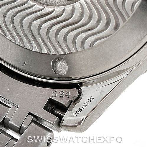 This is a close-up view of the case back and part of the bracelet of an Omega Seamaster 2561.80.00 Men
s Stainless Steel Blue Dial 2561.80.00 Men
s Stainless Steel Blue Dial watch.