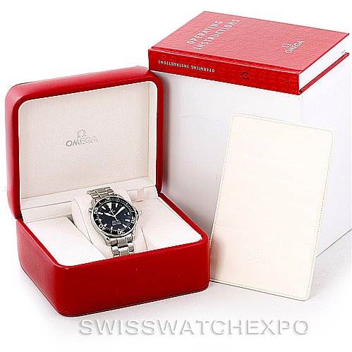 The Omega Seamaster 2254.50.00 Men
s Stainless Steel Black Dial 2254.50.00 Men
s Stainless Steel Black Dial watch is displayed in its red box alongside its warranty card and packaging.