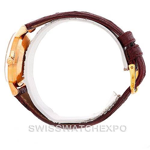 The image shows a side view of an Omega Seamaster 315.164 Men's Rose Gold Silver Dial 315.164 Men's Rose Gold Silver Dial watch focusing on the case, side buttons, and leather strap with a buckle.