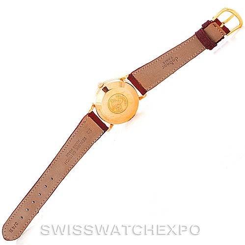 This image shows the back view of an Omega Seamaster 315.164 Men's Rose Gold Silver Dial 315.164 Men's Rose Gold Silver Dial watch with a brown leather strap and gold buckle.