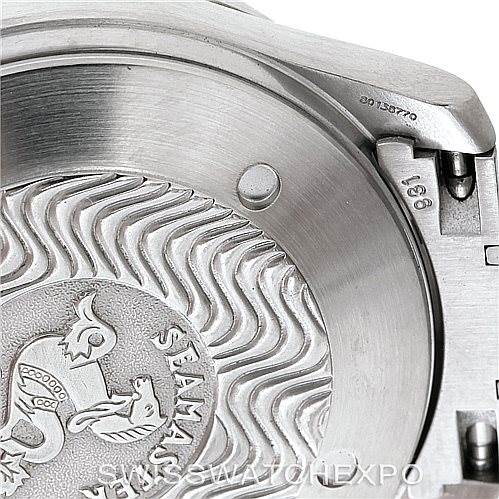 The image shows the back case of an Omega Seamaster 2538.20.00 Men
s Stainless Steel White Dial 2538.20.00 Men
s Stainless Steel White Dial watch at an angle that reveals part of its engraving and serial numbers.