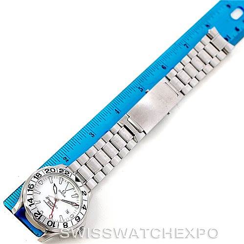 The image shows an Omega Seamaster 2538.20.00 Men
s Stainless Steel White Dial 2538.20.00 Men
s Stainless Steel White Dial watch laid flat beside a blue ruler, displaying the full band and face.