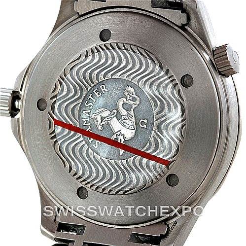 The image shows the case back of the Omega Seamaster 2031.50.00 Men
s Titanium Black Dial 2031.50.00 Men
s Titanium Black Dial watch, featuring engravings and a wave pattern.