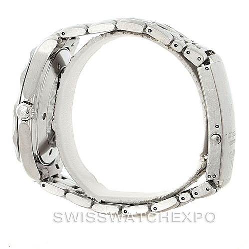 This side view of the Omega Seamaster 2541.80.00 Men
s Stainless Steel Blue Dial 2541.80.00 Men
s Stainless Steel Blue Dial watch displays its metallic case, crown, and bracelet.