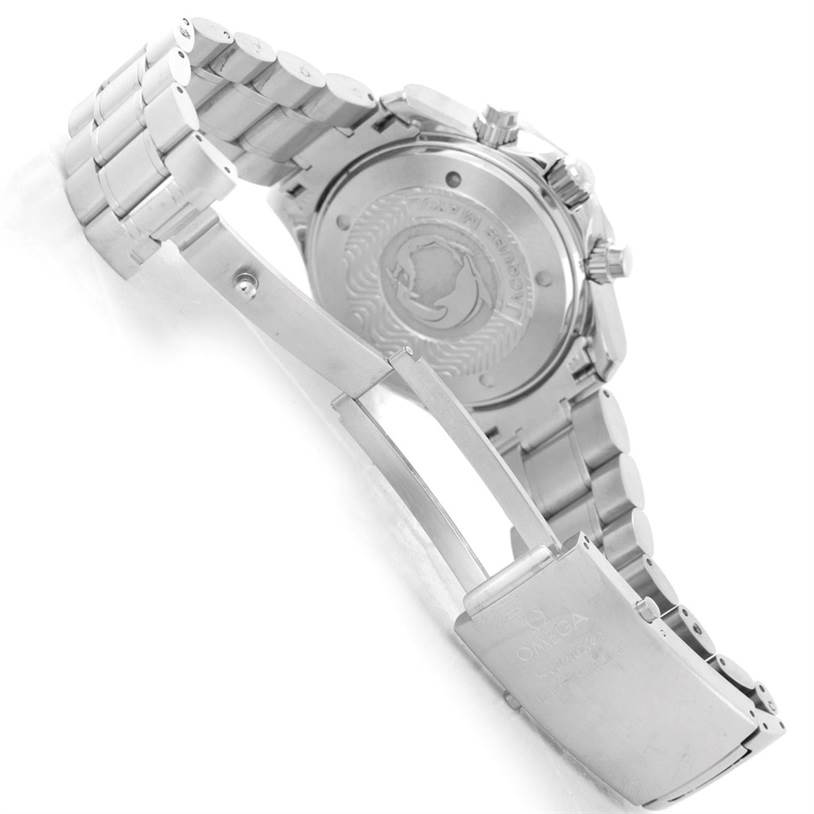 The photo shows the back of an Omega Seamaster 2595.30.00 Men
s Stainless Steel Silver Dial 2595.30.00 Men
s Stainless Steel Silver Dial watch and its open metal bracelet clasp.