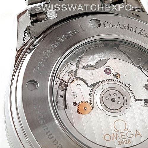 The image shows the back of an Omega Seamaster 2535.80.00 Men
s Stainless Steel Blue Dial 2535.80.00 Men
s Stainless Steel Blue Dial watch, highlighting the Co-Axial Escapement and visible internal mechanisms.