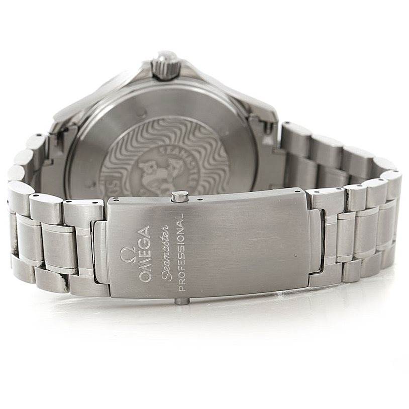 The image shows the back and bracelet clasp of an Omega Seamaster 2234.50.00 Men
s Stainless Steel Black Dial 2234.50.00 Men
s Stainless Steel Black Dial watch, highlighting the engraved clasp and the case back.