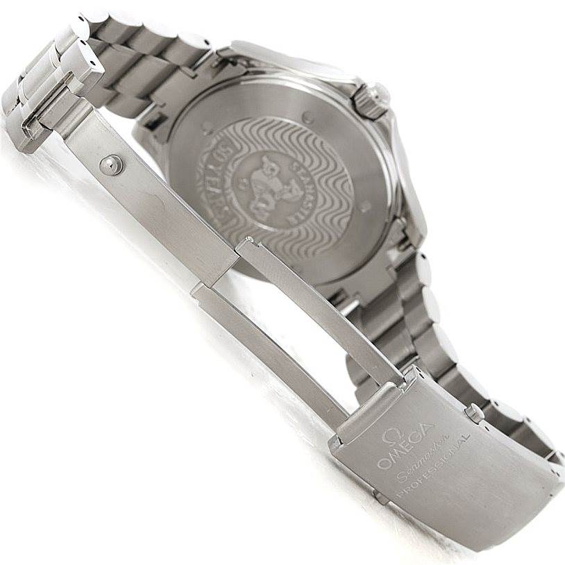 The image shows the back case, clasp, and part of the bracelet of an Omega Seamaster 2234.50.00 Men
s Stainless Steel Black Dial 2234.50.00 Men
s Stainless Steel Black Dial watch.