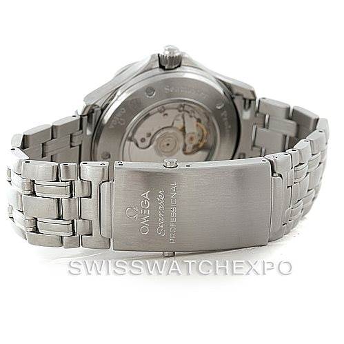 The image shows the back view of an Omega Seamaster 2535.80.00 Men
s Stainless Steel Blue Dial 2535.80.00 Men
s Stainless Steel Blue Dial watch, focusing on the bracelet, clasp, and the transparent case back revealing the movement.