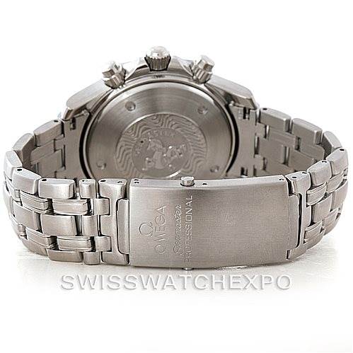 The image shows the backside and bracelet of the Omega Seamaster 2598.80.00 Men
s Stainless Steel Blue Dial 2598.80.00 Men
s Stainless Steel Blue Dial watch, including the clasp and caseback
s intricate engraving.