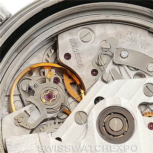 The image shows a close-up of the Omega Seamaster 2598.80.00 Men
s Stainless Steel Blue Dial 2598.80.00 Men
s Stainless Steel Blue Dial
s internal movement components, including gears and springs.