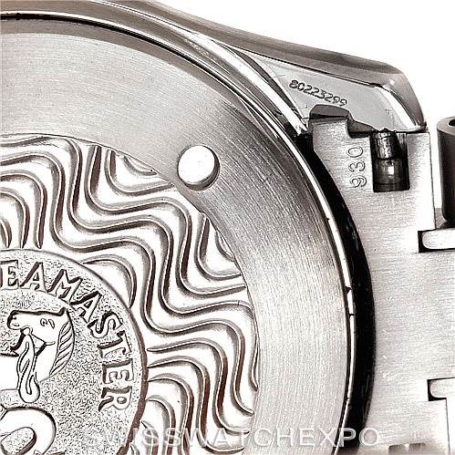 This close-up image shows the case back of an Omega Seamaster 2254.50.00 Men
s Stainless Steel Black Dial 2254.50.00 Men
s Stainless Steel Black Dial watch, highlighting the engraved design and part of the bracelet attachment.