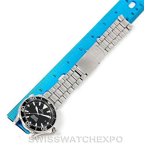 This image shows an Omega Seamaster 2254.50.00 Men
s Stainless Steel Black Dial 2254.50.00 Men
s Stainless Steel Black Dial watch laid flat next to a ruler, displaying its full length and metal bracelet.