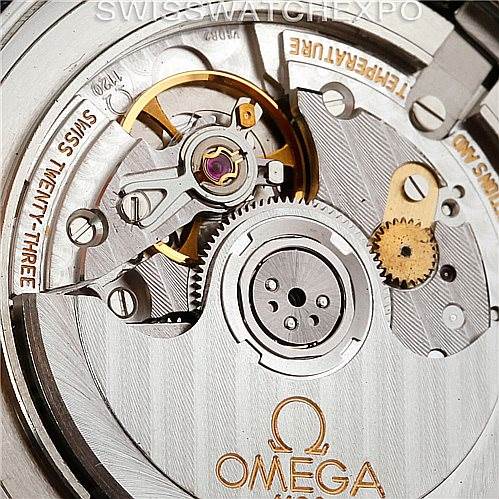 The image shows a close-up view of the internal mechanism of an Omega Seamaster 2254.50.00 Men
s Stainless Steel Black Dial 2254.50.00 Men
s Stainless Steel Black Dial watch, highlighting the gears and balance wheel.