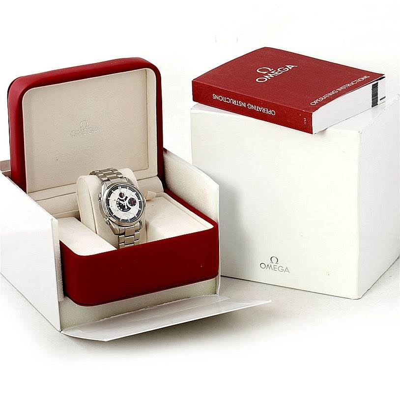 The Omega Seamaster 2513.30.00 Men
s Stainless Steel Silver Dial 2513.30.00 Men
s Stainless Steel Silver Dial watch is shown from the front, placed in an open box with an instruction manual beside it.