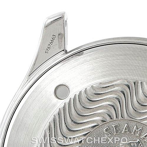 The image shows a close-up of an Omega Seamaster 2541.80.00 Men
s Stainless Steel Blue Dial 2541.80.00 Men
s Stainless Steel Blue Dial watch case back, highlighting its serial number and wavy pattern design.