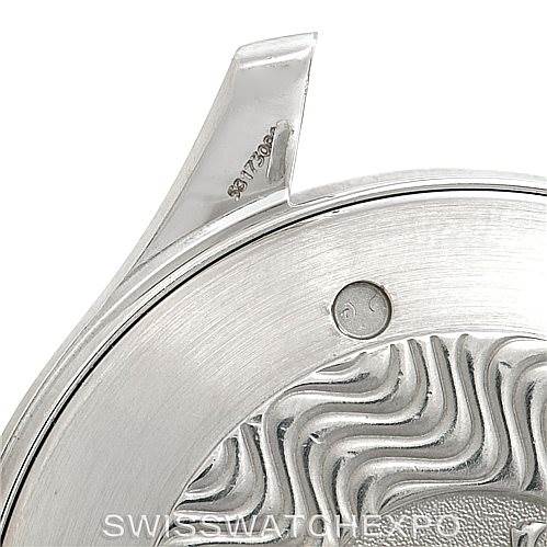 The image shows a close-up angle of the Omega Seamaster 2064.50.00 Men
s Stainless Steel Black Dial 2064.50.00 Men
s Stainless Steel Black Dial watch case, highlighting the detailed engraving and part of the bezel.
