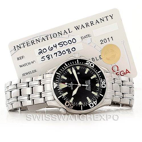 The image shows the Omega Seamaster 2064.50.00 Men
s Stainless Steel Black Dial 2064.50.00 Men
s Stainless Steel Black Dial watch at a slight angle, accompanied by its international warranty card.
