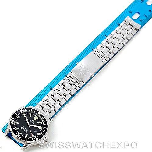 The image shows an Omega Seamaster 2064.50.00 Men
s Stainless Steel Black Dial 2064.50.00 Men
s Stainless Steel Black Dial watch laid flat, displaying the full length of its metal bracelet and clasp, alongside a blue measuring tool.