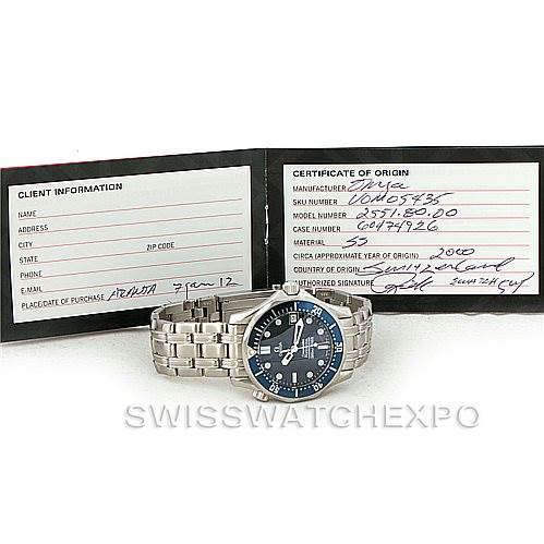 The image shows an Omega Seamaster 2551.80.00 Men
s Stainless Steel Blue Dial 2551.80.00 Men
s Stainless Steel Blue Dial watch and its accompanying paperwork, including a certificate of origin.