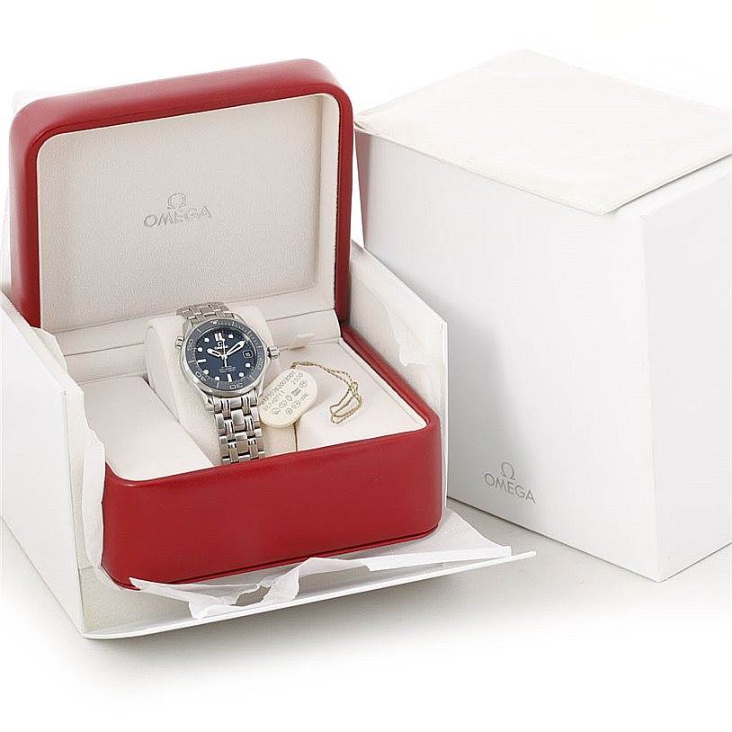 The Omega Seamaster 212.30.36.20.03.001 Men
s Stainless Steel Blue Dial 212.30.36.20.03.001 Men
s Stainless Steel Blue Dial watch is shown from a front angle, housed in its red presentation box with original tags and packaging.