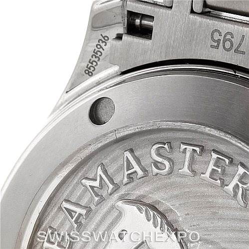 Close-up of the back case and bracelet of an Omega Seamaster 212.30.36.20.01.002 Men
s Stainless Steel Black Dial 212.30.36.20.01.002 Men
s Stainless Steel Black Dial watch, showcasing detailed engravings.