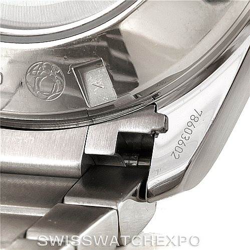 The image shows a close-up of the clasp and part of the case back of an Omega Seamaster 231.10.44.52.06.001 Men
s Stainless Steel Grey Dial 231.10.44.52.06.001 Men
s Stainless Steel Grey Dial watch.