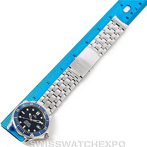 The image shows the Omega Seamaster 2531.80.00 Men
s Stainless Steel Blue Dial 2531.80.00 Men
s Stainless Steel Blue Dial watch laid flat, with a blue ruler positioned next to it to measure the length.