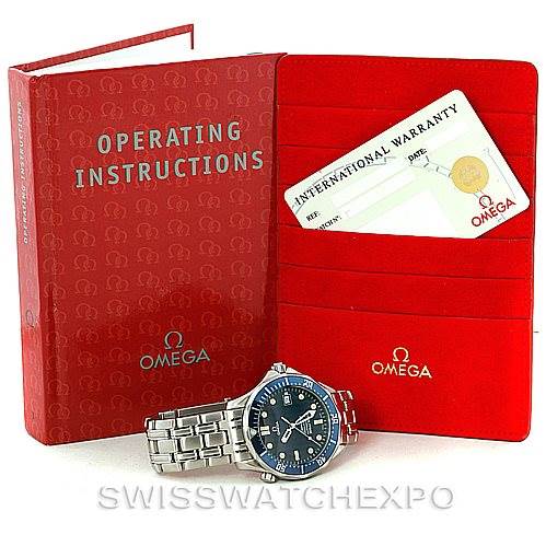 The image shows an Omega Seamaster 2531.80.00 Men
s Stainless Steel Blue Dial 2531.80.00 Men
s Stainless Steel Blue Dial watch with its operating instructions booklet and international warranty card holder.