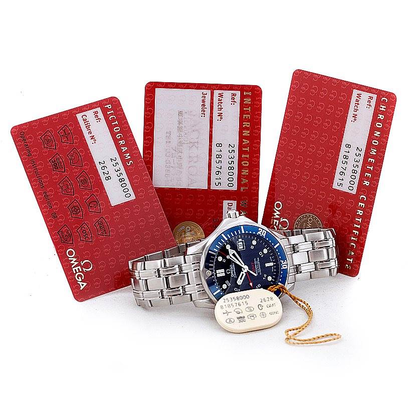 The Omega Seamaster 2535.80.00 Men
s Stainless Steel Blue Dial 2535.80.00 Men
s Stainless Steel Blue Dial watch is shown from the front, accompanied by red warranty and certification cards.
