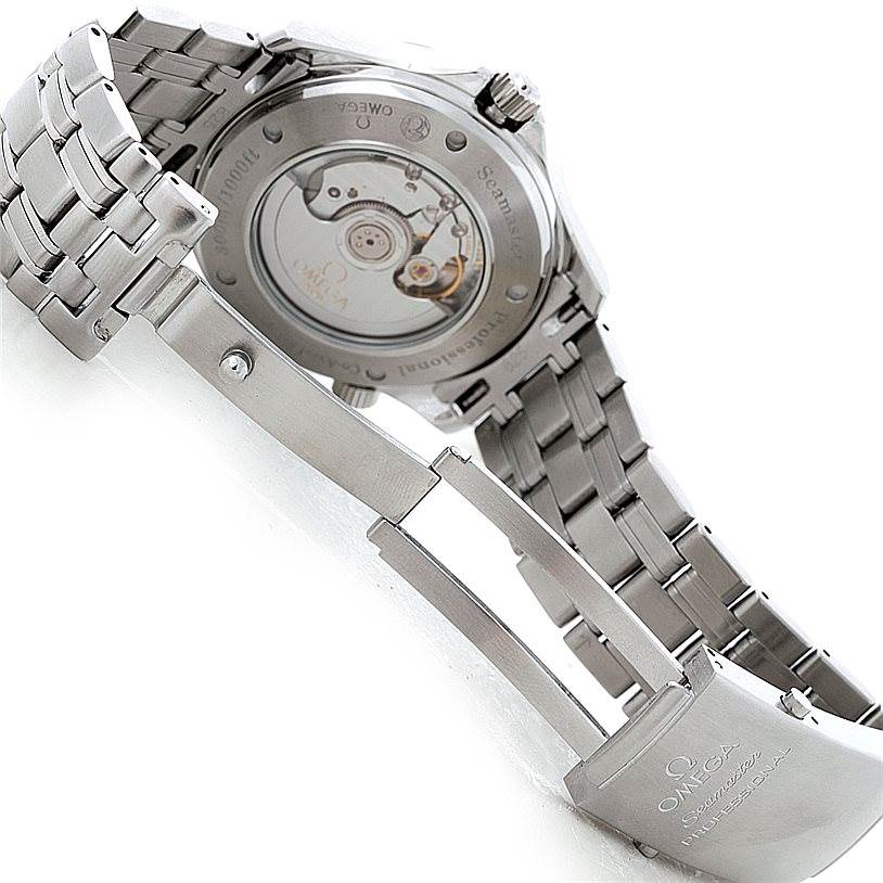 The image shows the back and open clasp of an Omega Seamaster 2535.80.00 Men
s Stainless Steel Blue Dial 2535.80.00 Men
s Stainless Steel Blue Dial watch, highlighting the mechanical movement and stainless steel bracelet.