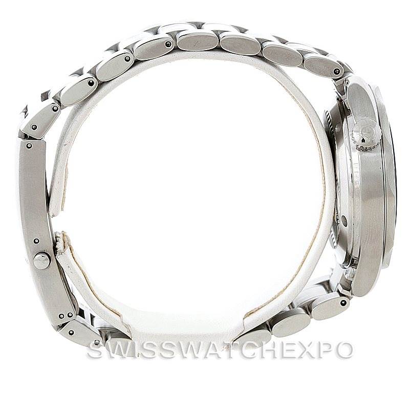 The Omega Seamaster 2253.80.00 Men
s Stainless Steel Blue Dial 2253.80.00 Men
s Stainless Steel Blue Dial watch is shown from the side, displaying the bracelet links and the crown.