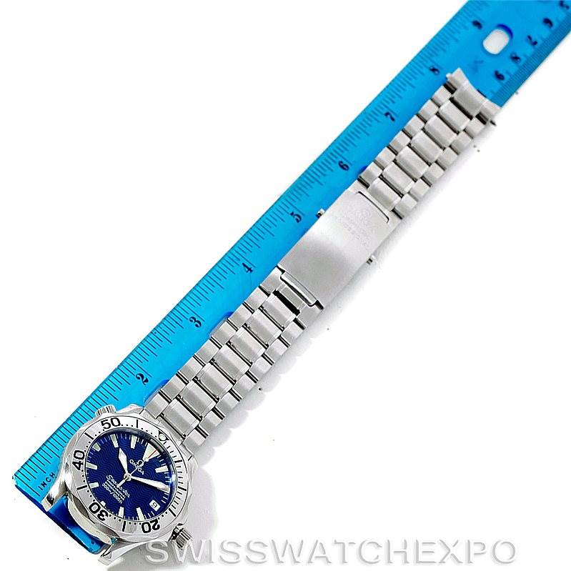 This image shows an Omega Seamaster 2253.80.00 Men
s Stainless Steel Blue Dial 2253.80.00 Men
s Stainless Steel Blue Dial watch laid out flat, measured against a blue ruler.