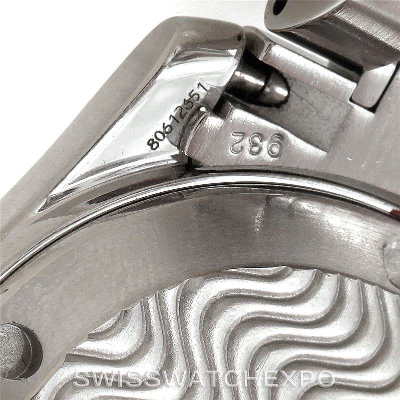 Close-up of the Omega Seamaster 2253.80.00 Men
s Stainless Steel Blue Dial 2253.80.00 Men
s Stainless Steel Blue Dial watch showing the bracelet
s end link and serial number.