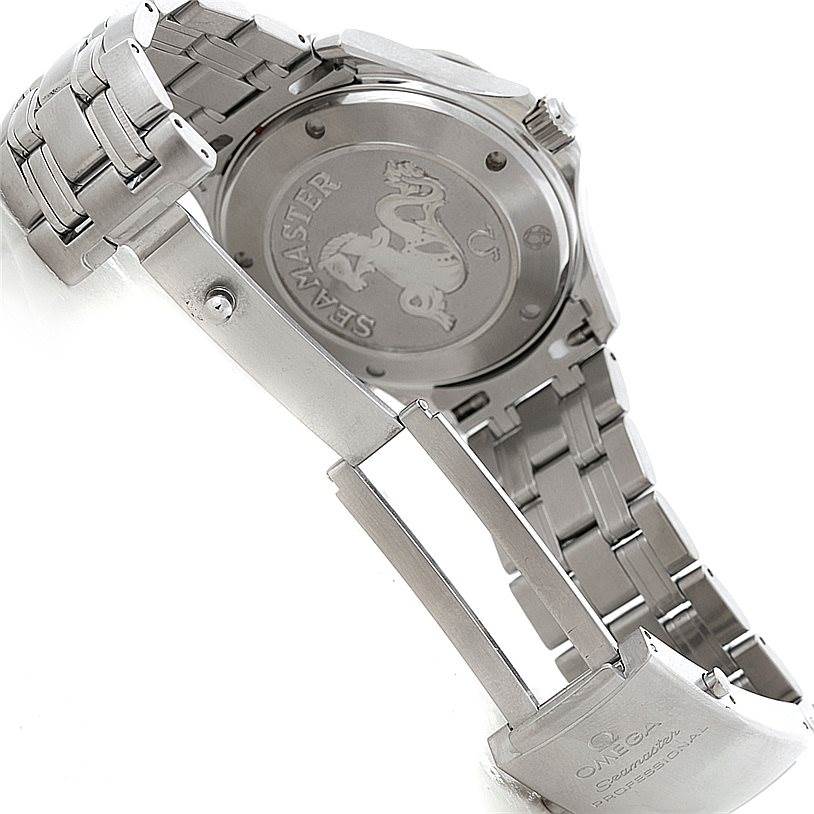 The image shows the back case and bracelet clasp of an Omega Seamaster 2220.80.00 Men
s Stainless Steel Blue Dial 2220.80.00 Men
s Stainless Steel Blue Dial watch, including its engraved logo.