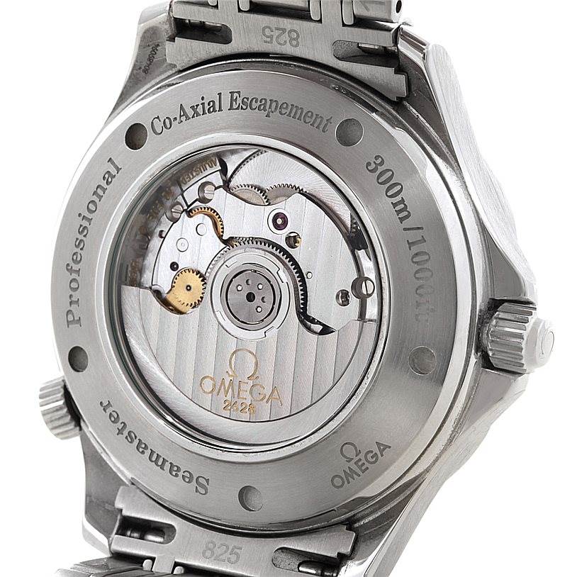 The image shows the back view of the Omega Seamaster 2535.80.00 Men
s Stainless Steel Blue Dial 2535.80.00 Men
s Stainless Steel Blue Dial watch, highlighting its movement and Co-Axial escapement.