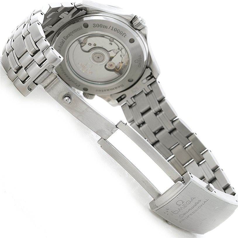 The image shows the back and clasp of an Omega Seamaster 2535.80.00 Men
s Stainless Steel Blue Dial 2535.80.00 Men
s Stainless Steel Blue Dial watch, displaying its mechanism and engraved details.