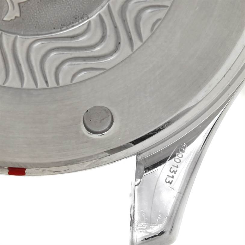 This image shows a close-up of the back case of an Omega Seamaster 2599.80.00 Men
s Stainless Steel Blue Dial 2599.80.00 Men
s Stainless Steel Blue Dial watch, highlighting the engraved details and serial number.