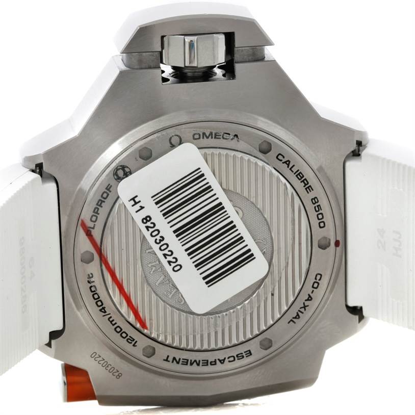 The image shows the back view of an Omega Ploprof 224.32.55.21.04.001 Men's Stainless Steel White Dial 224.32.55.21.04.001 Men's Stainless Steel White Dial watch, displaying the case back, bezel, strap, and barcode sticker.