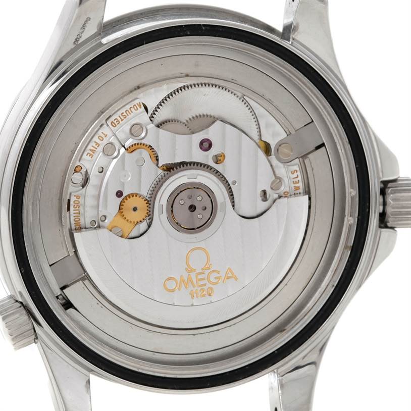 The image shows the inner movement mechanism of an Omega Seamaster 2455.50.00 Men
s Stainless Steel Black Dial 2455.50.00 Men
s Stainless Steel Black Dial watch from a back view.