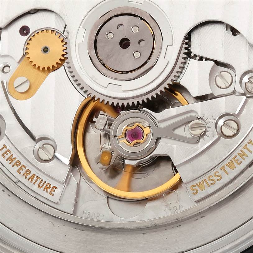 The image shows a close-up of the movement mechanism in an Omega Seamaster 2455.50.00 Men
s Stainless Steel Black Dial 2455.50.00 Men
s Stainless Steel Black Dial watch.