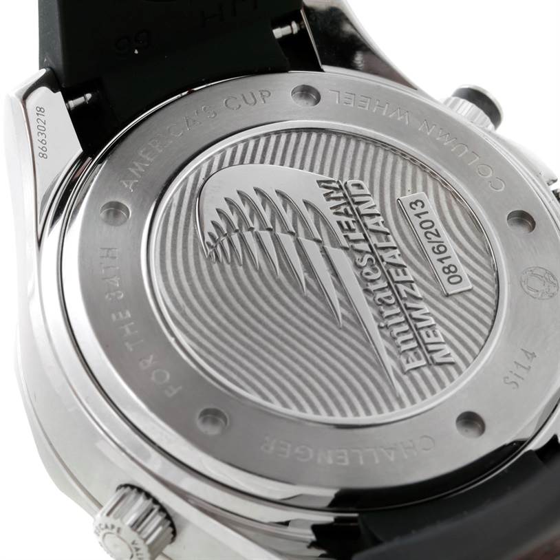 The image shows the case back of an Omega Seamaster 212.32.44.50.01.001 Men's Stainless Steel Black Dial 212.32.44.50.01.001 Men's Stainless Steel Black Dial watch with engravings commemorating the Emirates Team New Zealand and America's Cup.