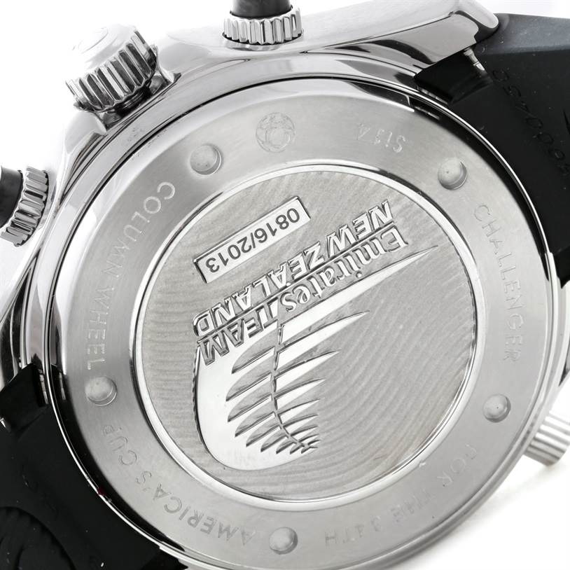 The image shows the case back and crowns of an Omega Seamaster 212.32.44.50.01.001 Men's Stainless Steel Black Dial 212.32.44.50.01.001 Men's Stainless Steel Black Dial watch, displaying the “Emirates Team New Zealand” engraving.