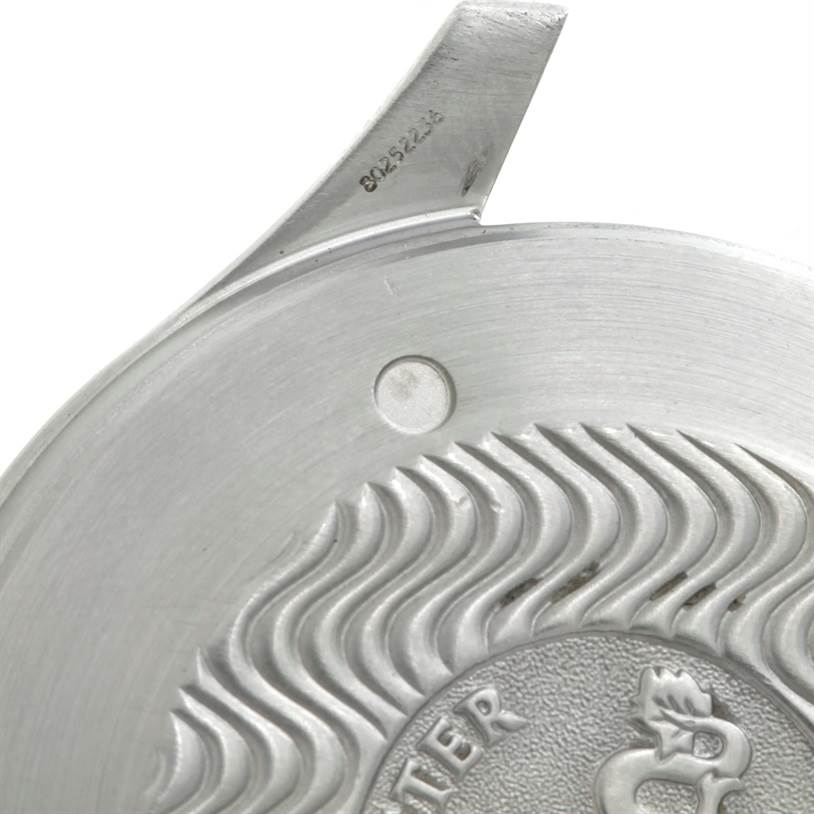 This image shows a close-up of the case back of an Omega Seamaster 2538.20.00 Men
s Stainless Steel White Dial 2538.20.00 Men
s Stainless Steel White Dial watch, highlighting its engravings and wave pattern.