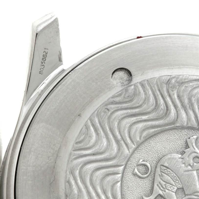 The image shows the engraved case back and partially visible lug of an Omega Seamaster 2254 50 00 Men
s Stainless Steel Black Dial 2254 50 00 Men
s Stainless Steel Black Dial watch from a close-up angle.