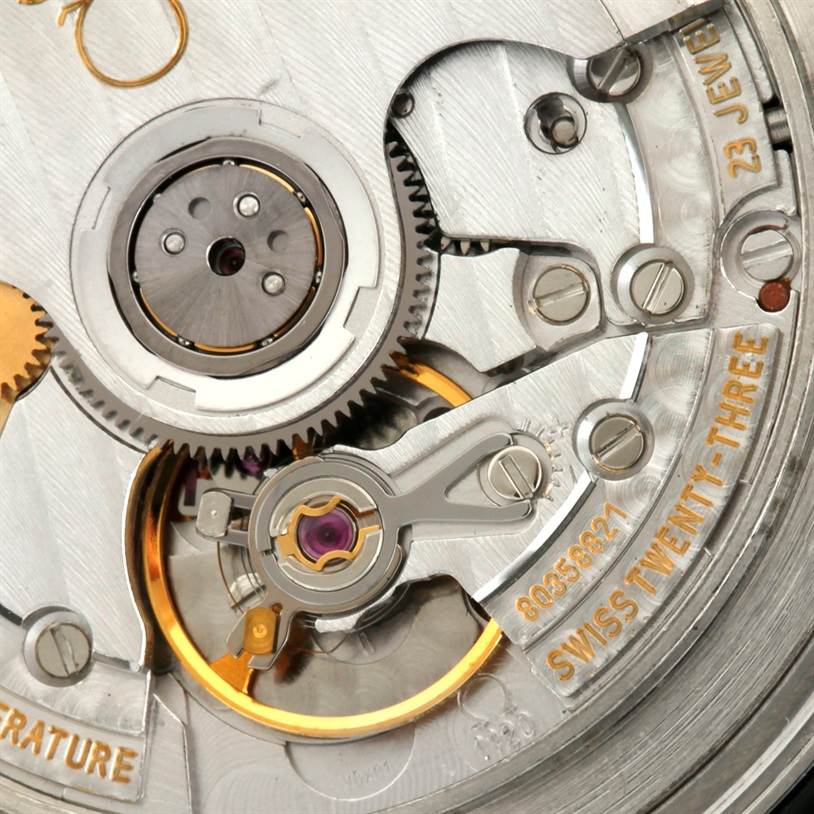 Close-up view of the Omega Seamaster 2254 50 00 Men
s Stainless Steel Black Dial 2254 50 00 Men
s Stainless Steel Black Dial
s intricate internal mechanism, displaying gears and jewels.