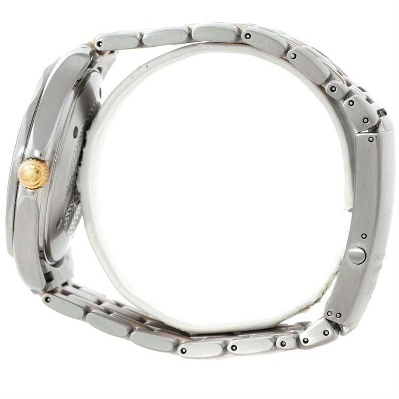 The image shows a side view of an Omega Seamaster 2332.80.00 Men
s Stainless Steel Blue Dial 2332.80.00 Men
s Stainless Steel Blue Dial watch, highlighting the crown and metal bracelet.