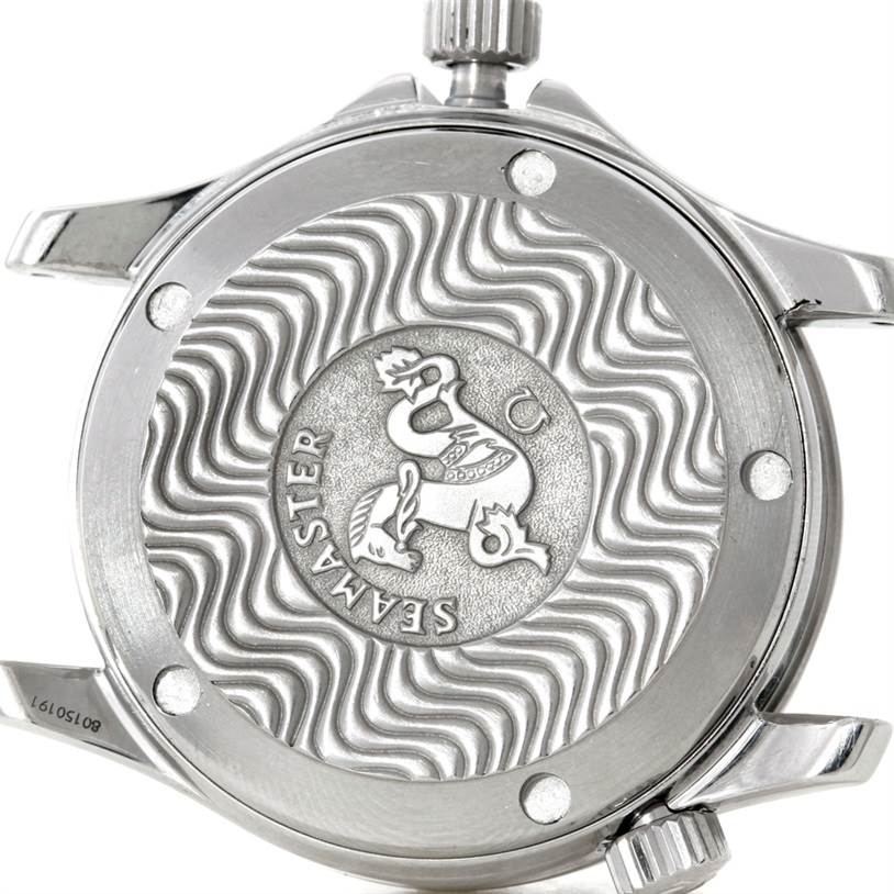 This image shows the back case of an Omega Seamaster Men
s Stainless Steel Blue Dial Men
s Stainless Steel Blue Dial watch, highlighting its intricate wave pattern and logo.