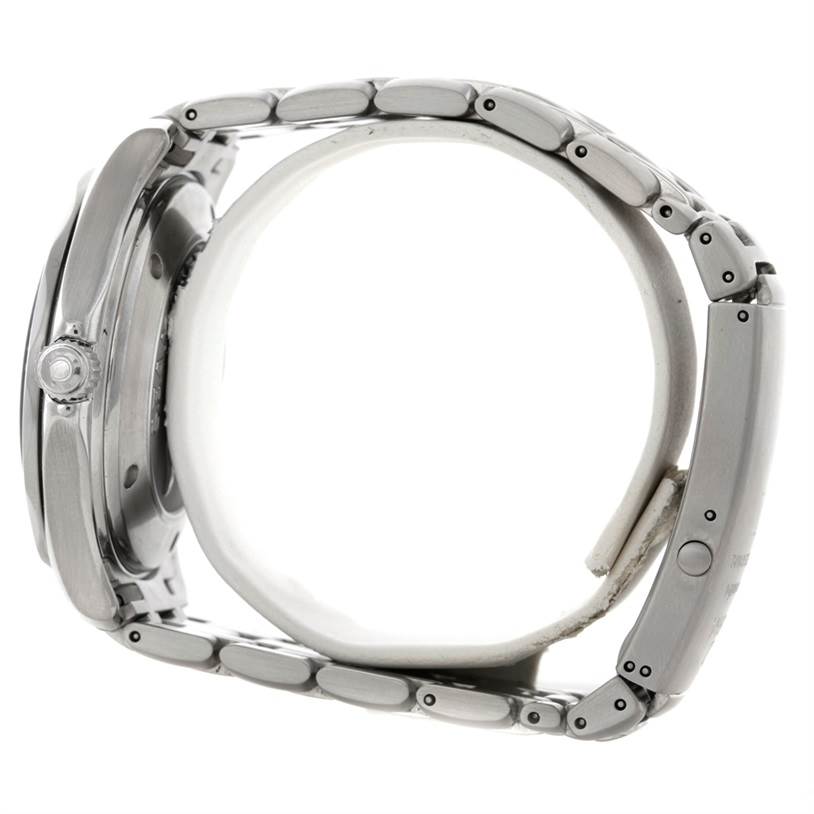 The Omega Seamaster 2220.80.00 Men
s Stainless Steel Blue Dial 2220.80.00 Men
s Stainless Steel Blue Dial watch is shown from a side view, displaying the case, crown, and metal bracelet.