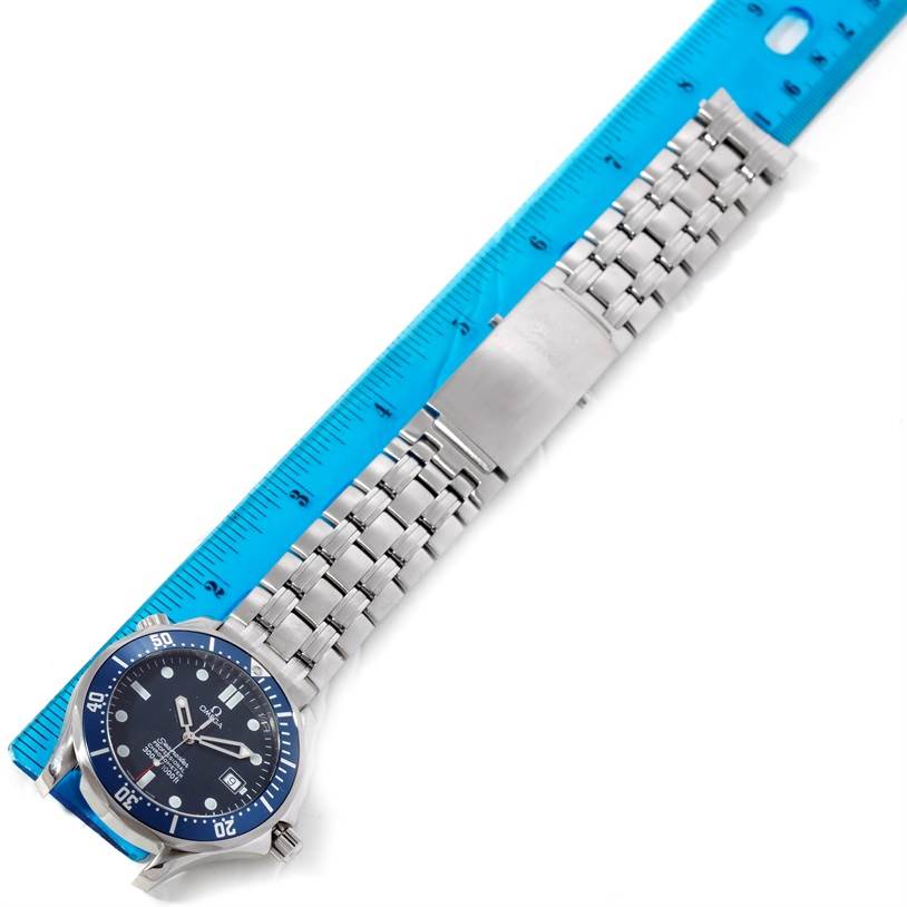 The image shows the Omega Seamaster 2531.80.00 Men
s Stainless Steel Blue Dial 2531.80.00 Men
s Stainless Steel Blue Dial watch laid flat, including the face, stainless steel bracelet, and clasp, with a ruler for scale.